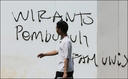 Graffiti says "Wiranto is a killer."