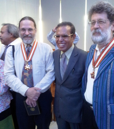 John M. iller, President Taur Matan Ruak and Charles Scheiner at awards cermony