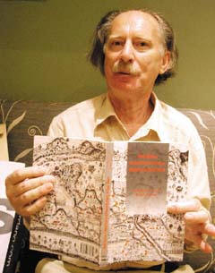 Co-author Geoff Gunn holds New Nation: UN Peace-Building in E Timor